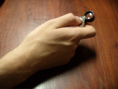 holding the hand lens